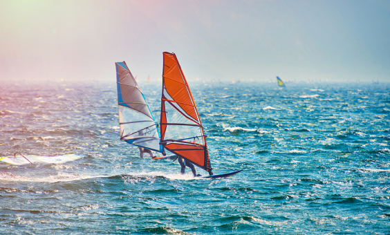 Wind surfers on the water